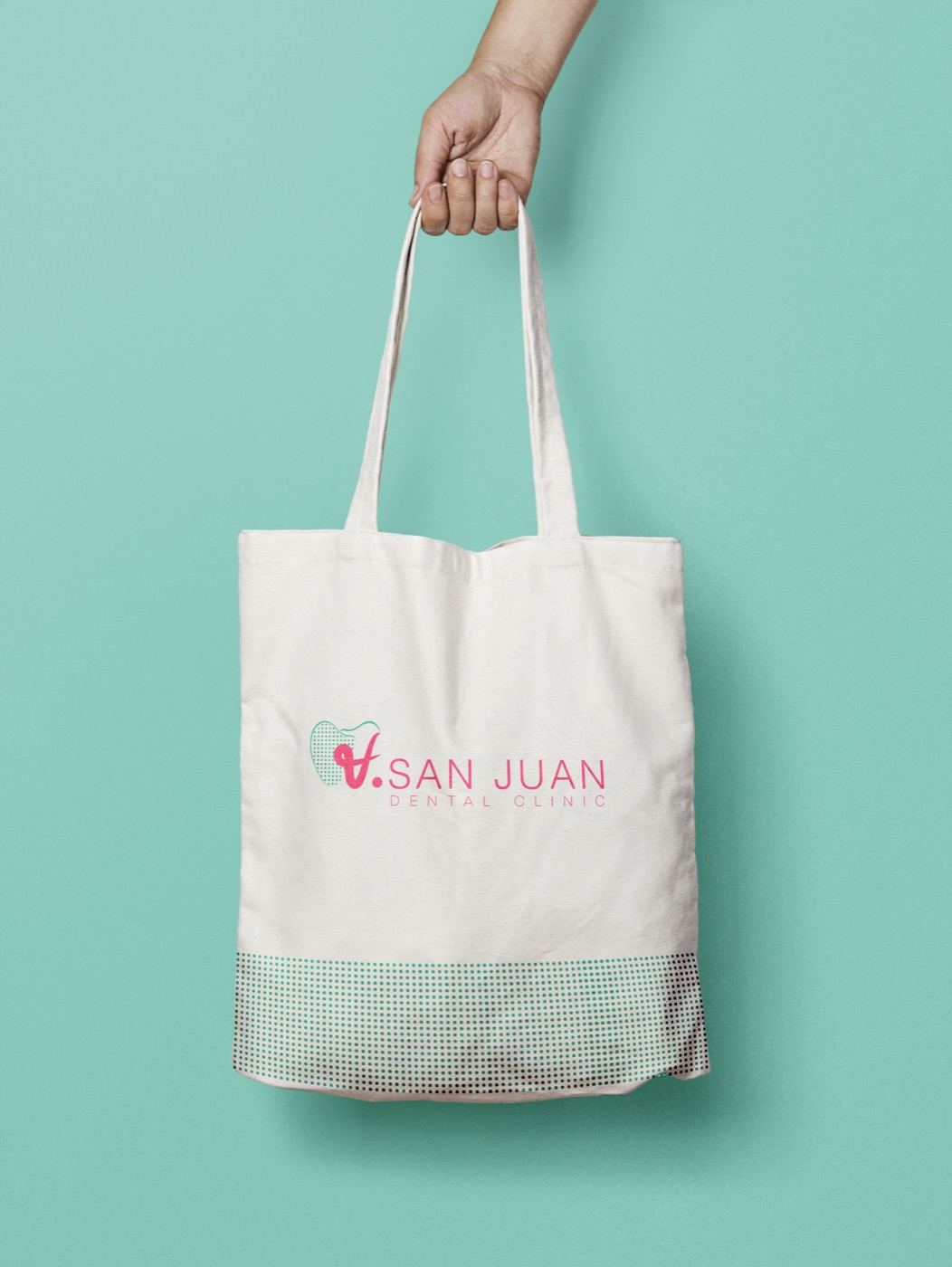 V. San Juan Dental Clinic branded tote bag.